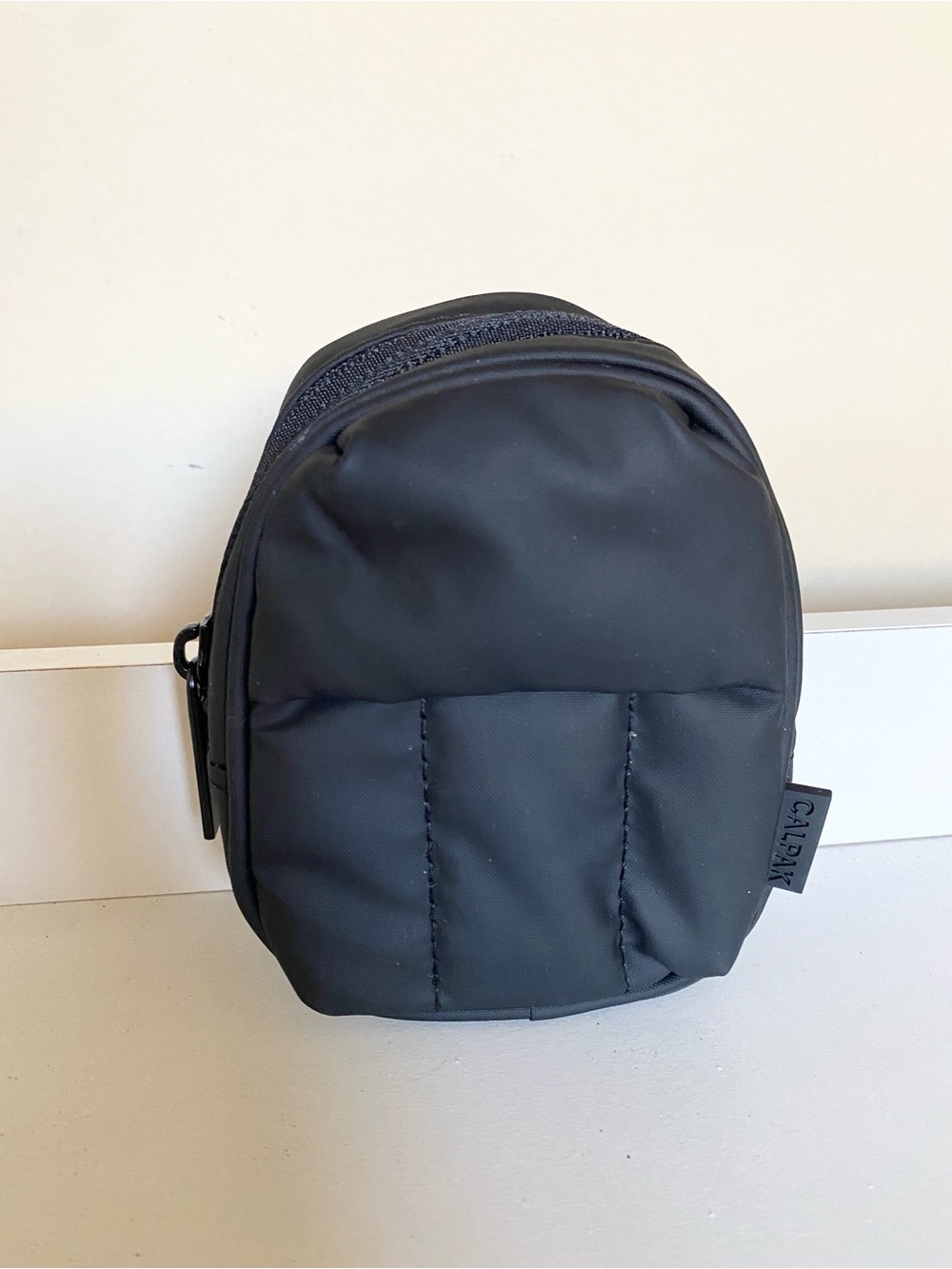 NWOT Calpak Luka Backpack Zip Bag Charm Keychain in Matte Black